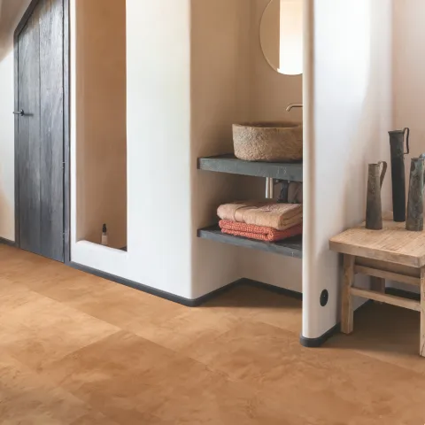 Revêtement de sol stratifié Quick-Step dans une salle de bain